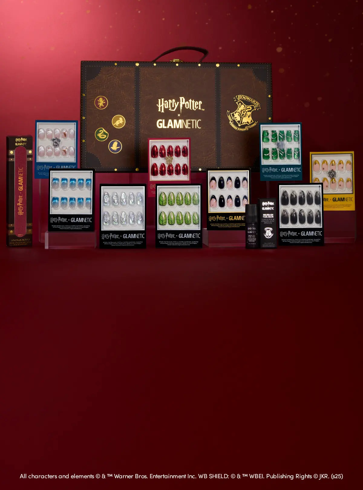Collection of Harry Potter-themed products including a large box and smaller containers on a red background.